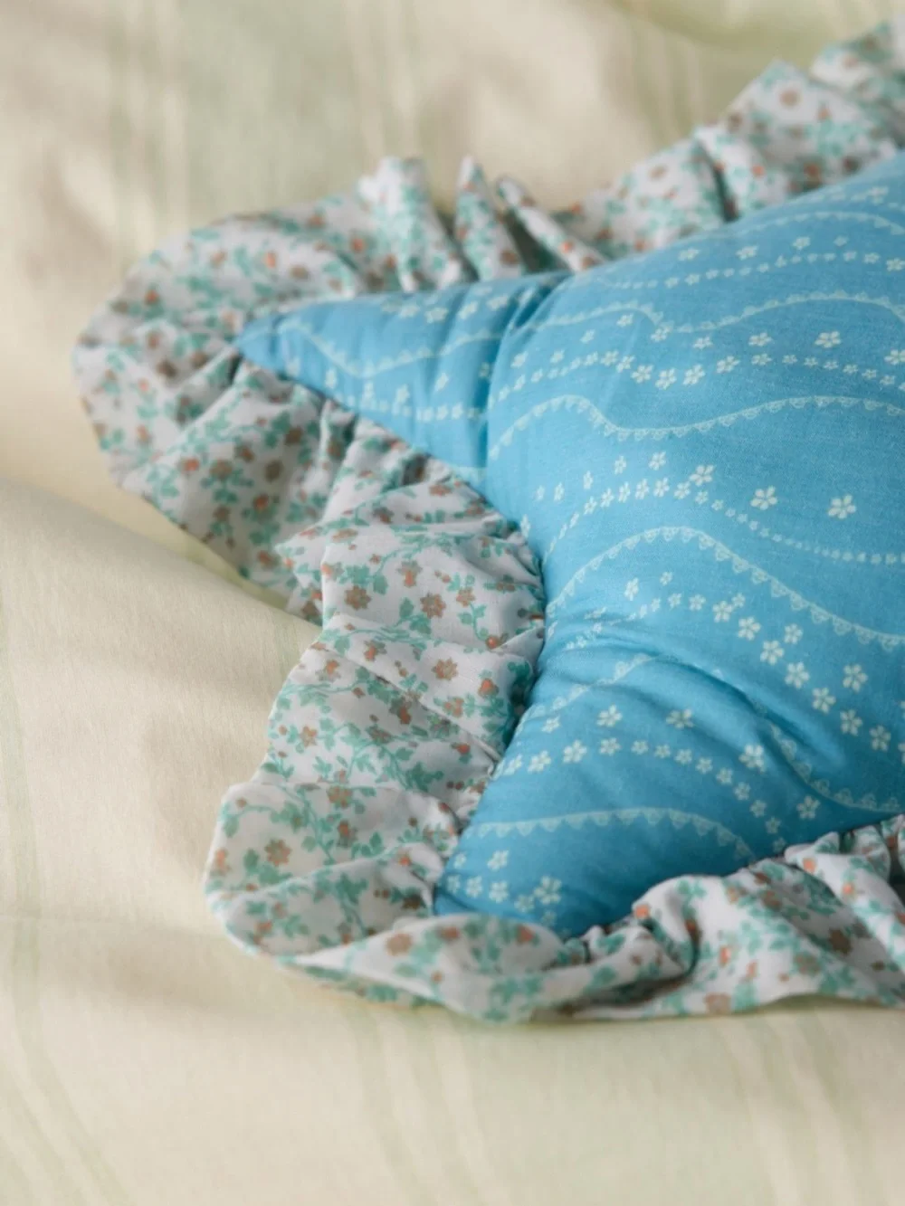 NWT Urban Outfitters Printed Star Shaped Ruffles Star Pillow in Blue Floral